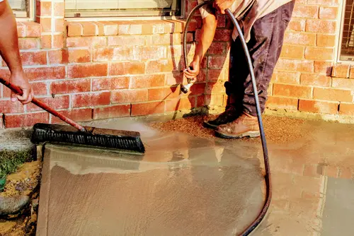 Crew working on interior floor leveling in Kingsport, TN to correct uneven flooring and improve home stability