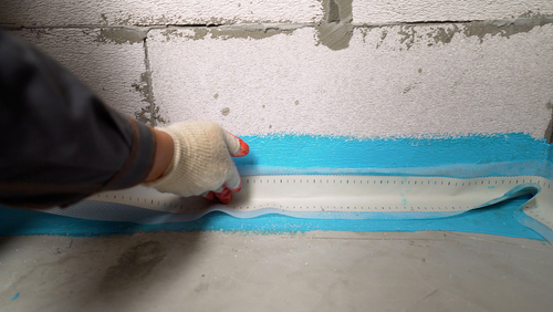 Waterproofing,the,bathroom,floor.,the,proper,placement,of,sealing,tape,